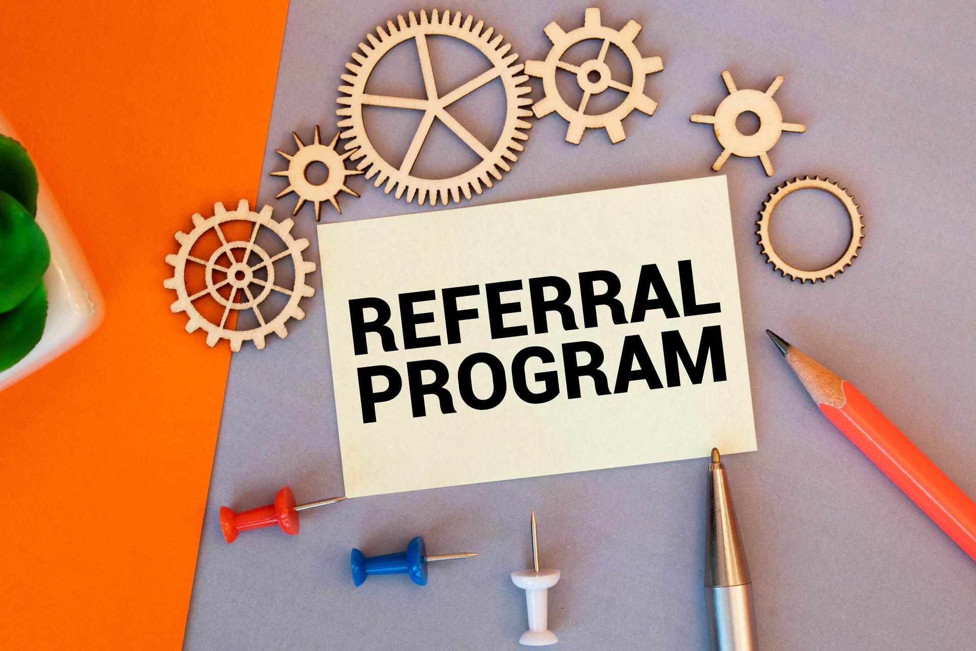 Notebook with Toolls and Notes about Referral Program