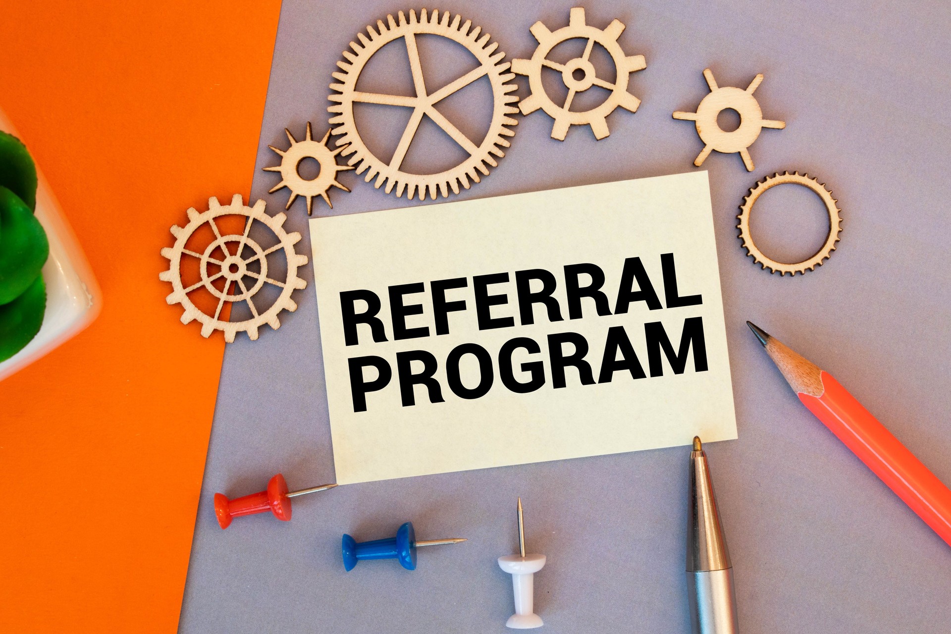 Notebook with Toolls and Notes about Referral Program