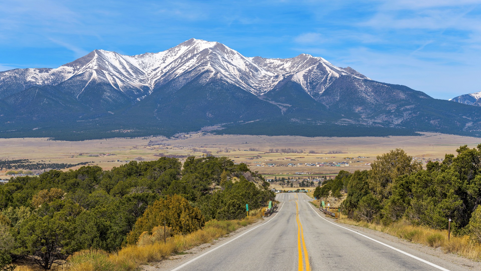 Mount Princeton - A panoramic Spring morning view of Snow-capped Mount Princeton towering above Buena Vista at Arkansas Valley, as seen from U.S. Route 285, Colorado, USA.